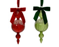 Ornate oxblood and pine green glass baubles with velvet bow