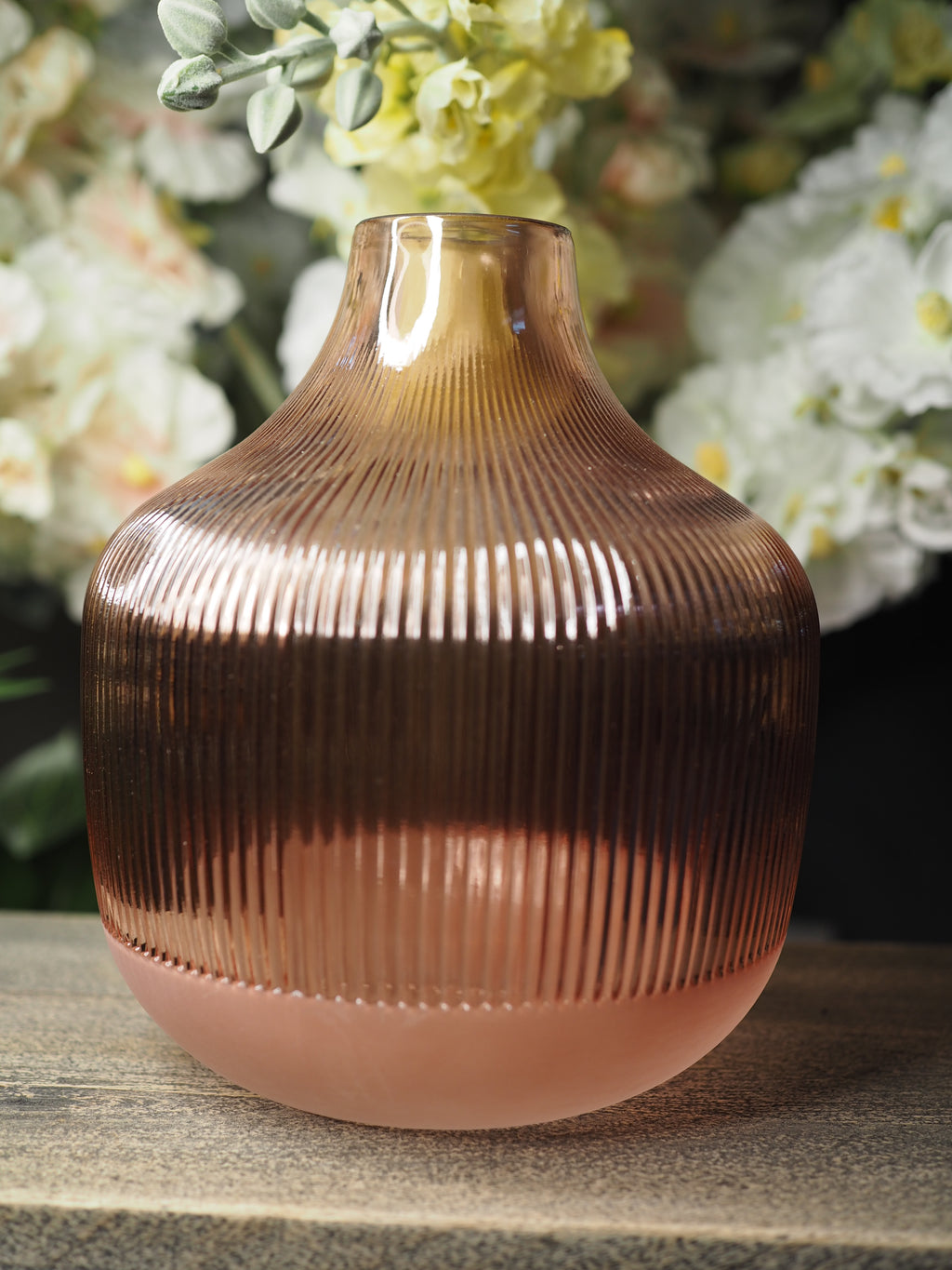 Pink ribbed glass vase