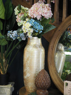 Gold glazed vase with mottled effect