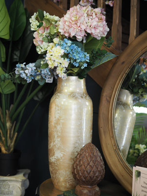 Gold glazed vase with mottled effect