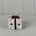White ceramic LED present with burgundy bow