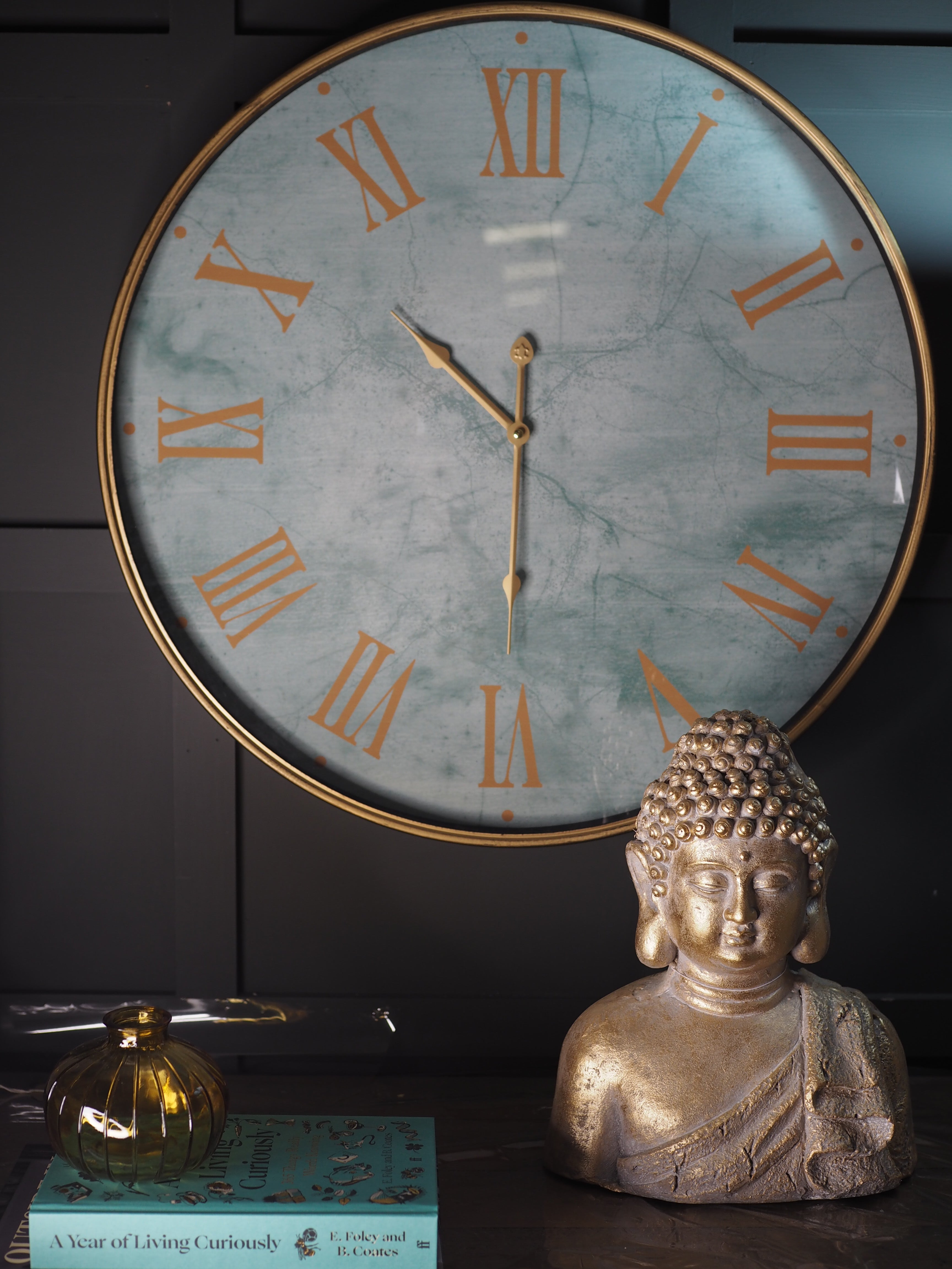 Turquoise marble face clock with gold Roman numerals