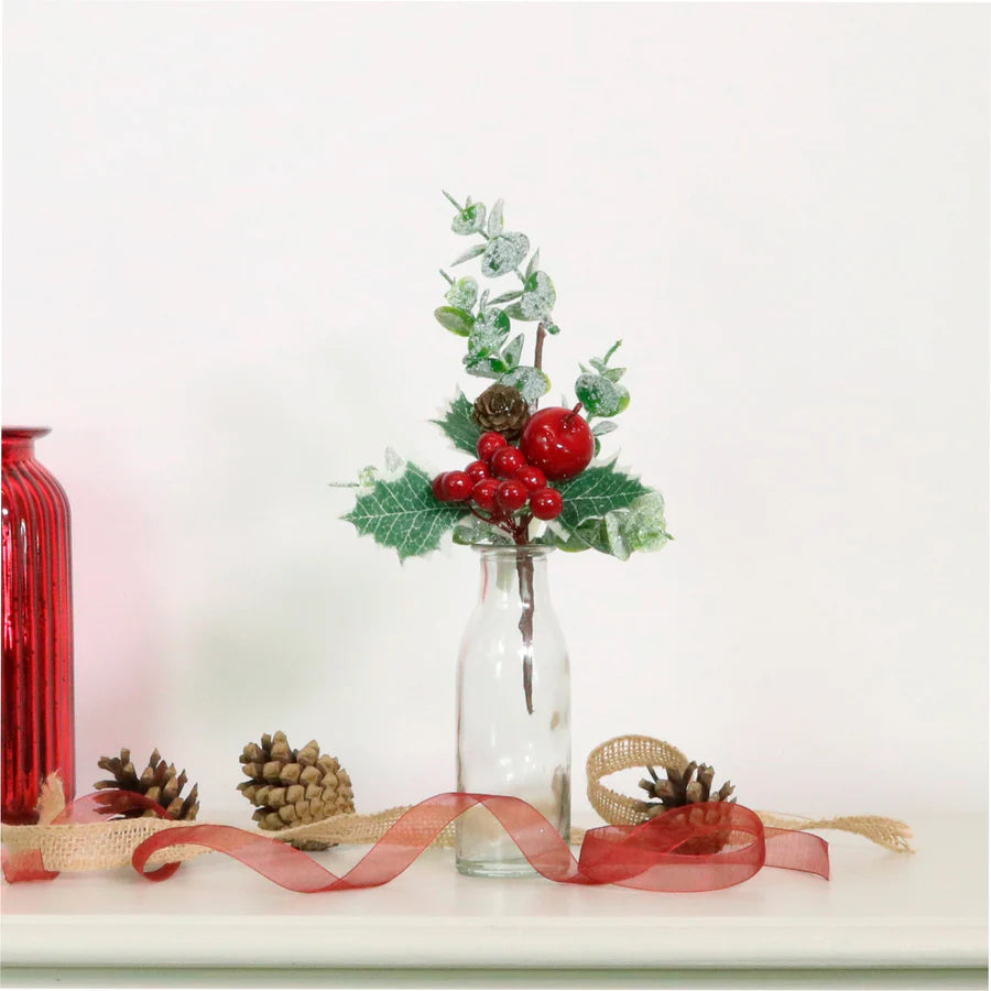 Festive pick with red berries and frosted eucalyptus