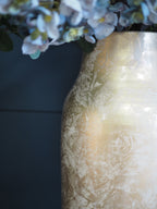 Gold glazed vase with mottled effect