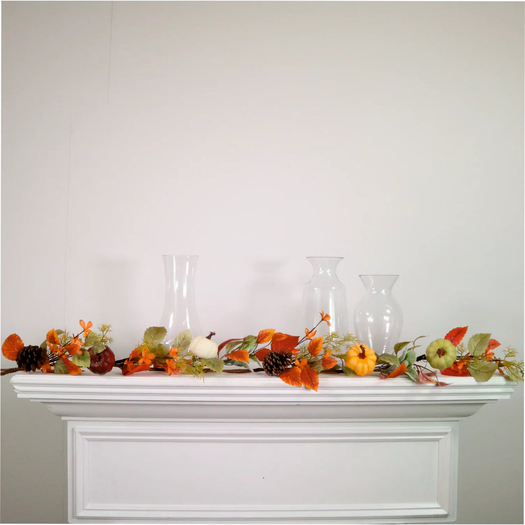 Autumn leaves, pumpkin and pine cone garland.