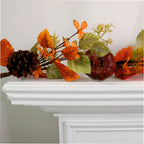 Autumn leaves, pumpkin and pine cone garland.