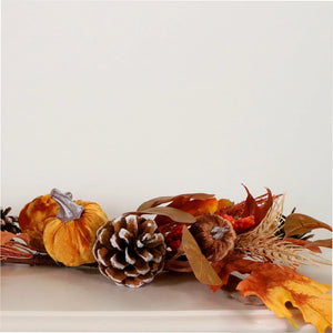 Autumn swag filled with pumpkins, pine cones and Autumn leaves
