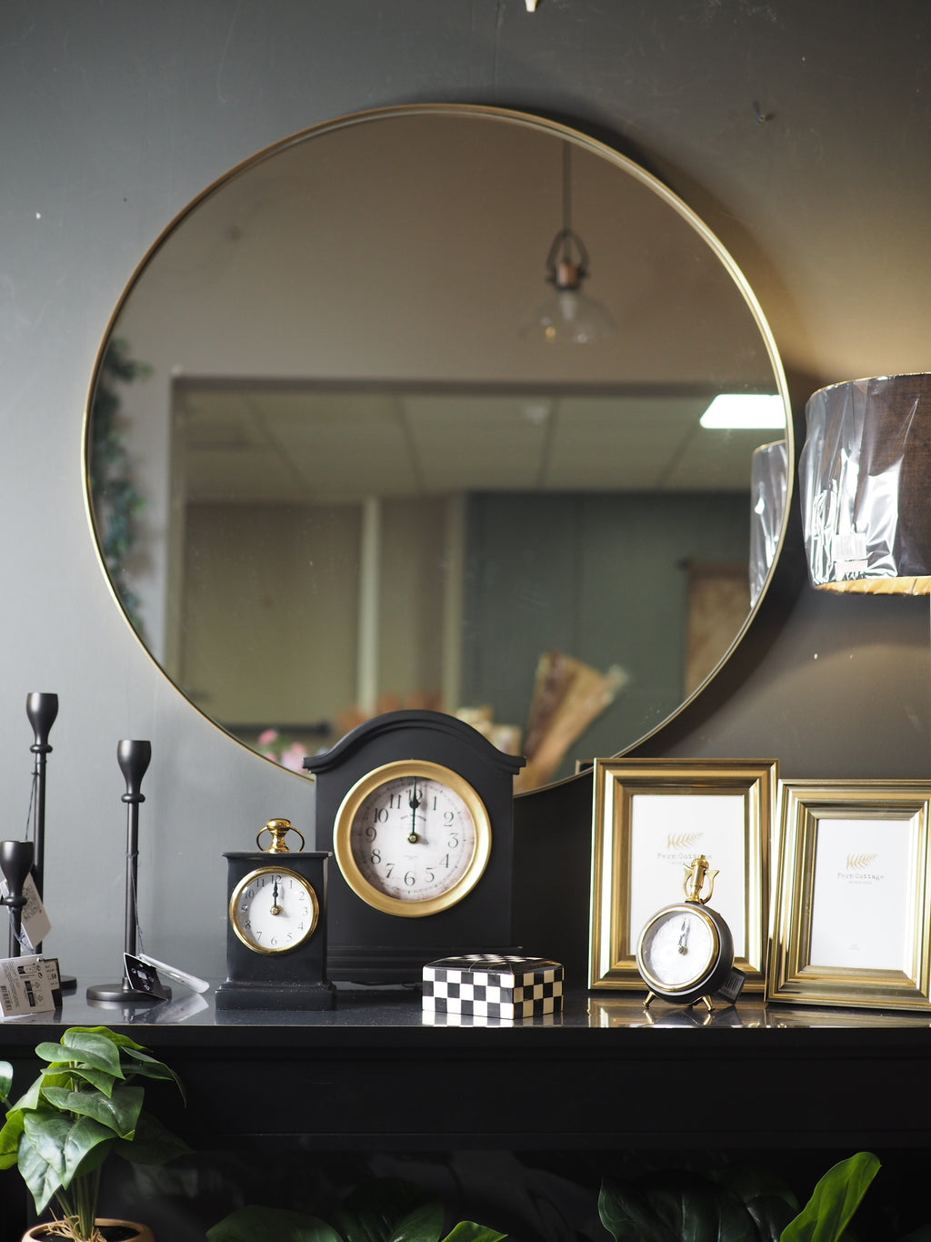 Brushed gold slim frame round wall mirror