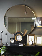 Brushed gold slim frame round wall mirror