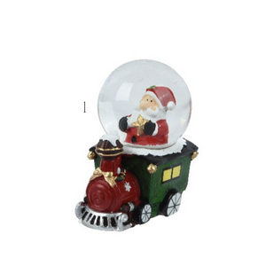 Christmas figure in snowglobe train
