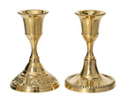 Short brass/gold candle holders