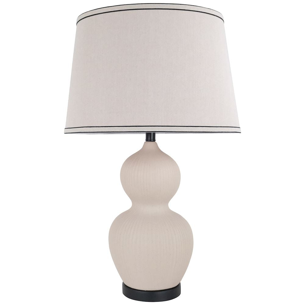 Ivory ceramic lamp with oatmeal and black trim shade