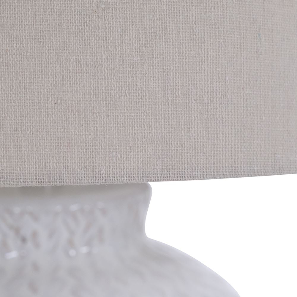 Ivory ceramic lamp with oatmeal shade