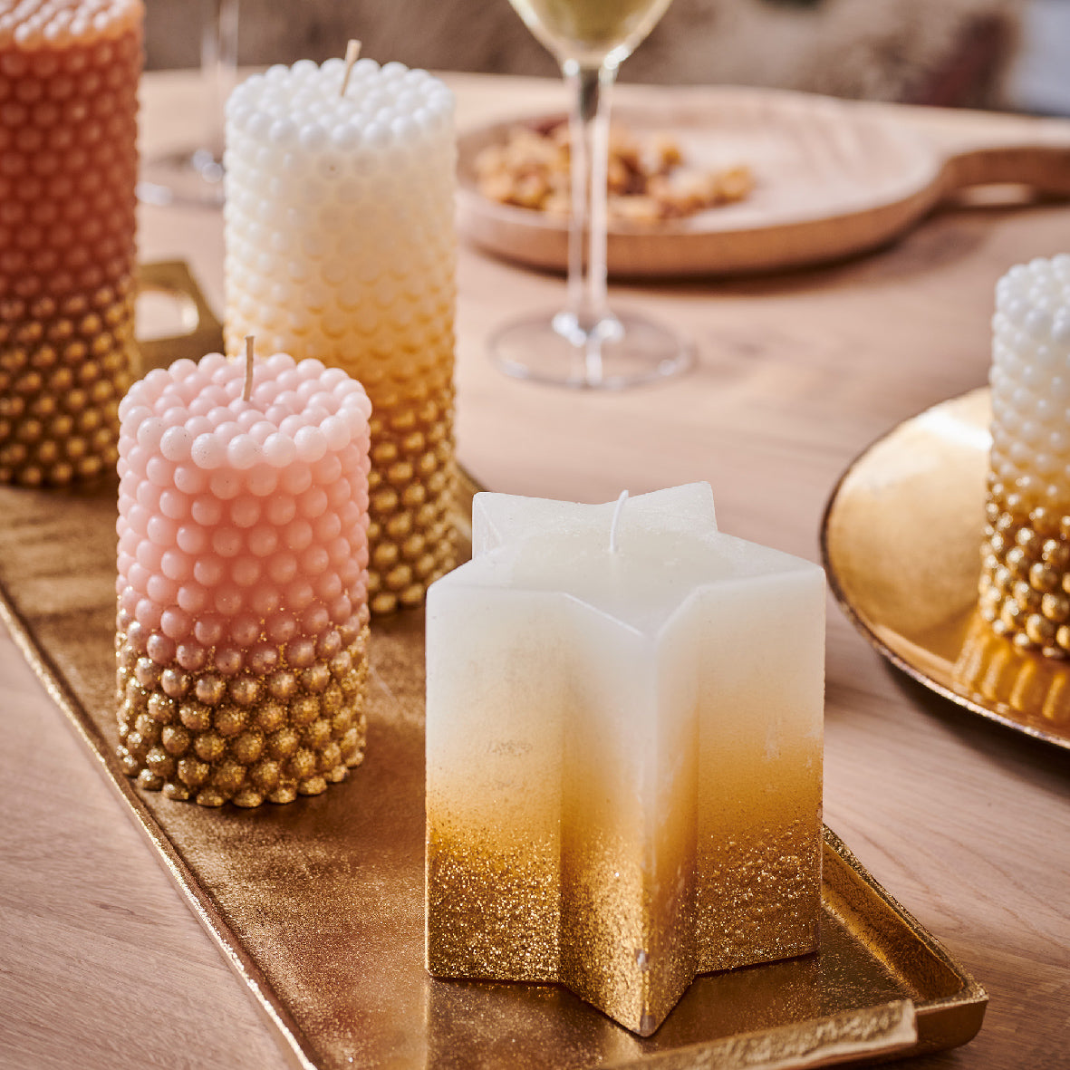 Tall ginger brown bubble effect candle with gold glitter