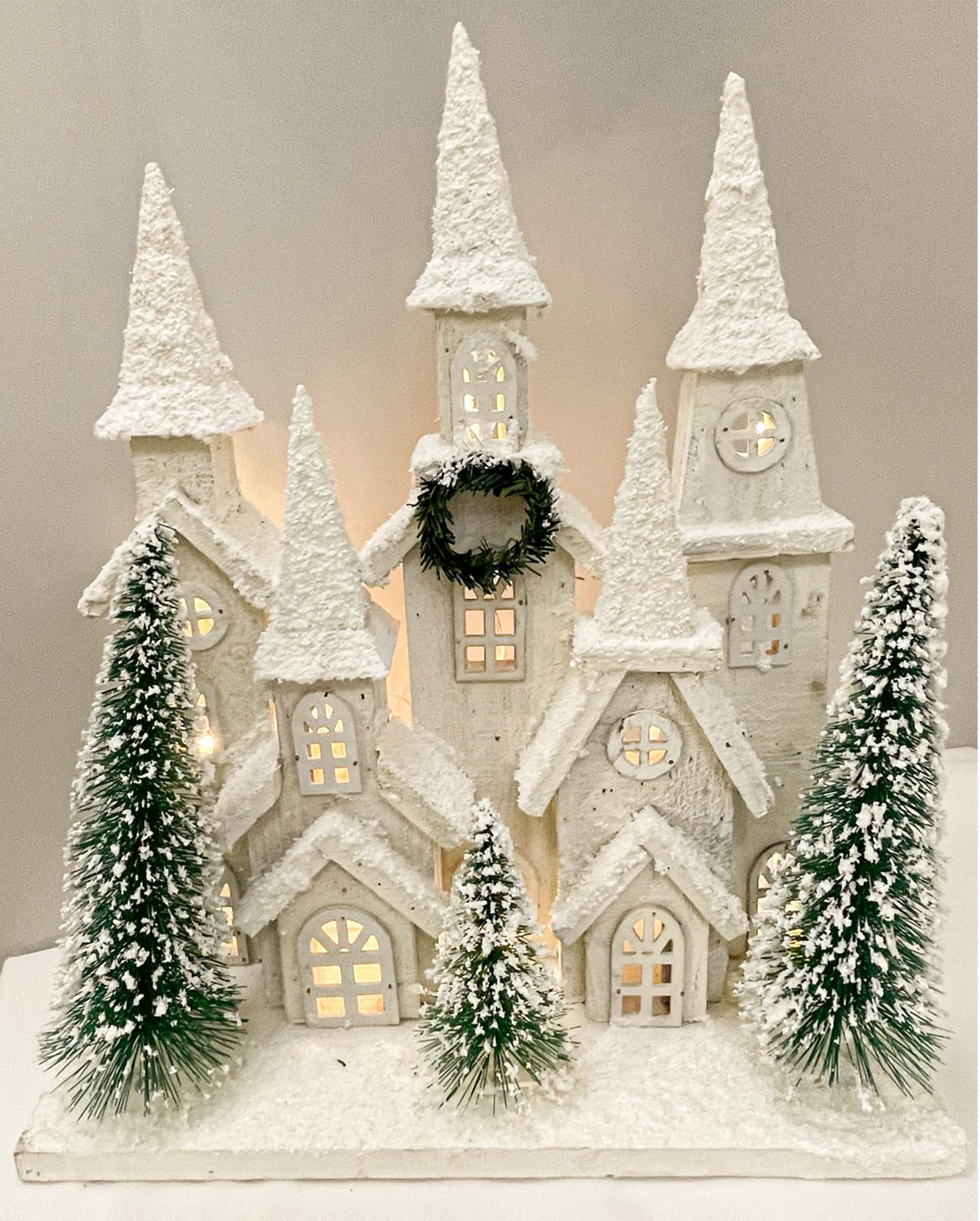 Small winter village scene with lights