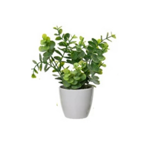 Faux plant in white pot