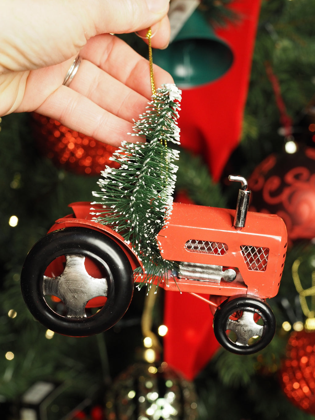 Metal tractor with tree hanging dec