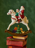 Santa and little boy on rocking horse ornament