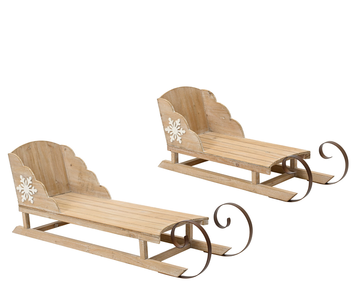 Wooden sleigh with white snowflake
