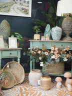 Two drawer green console table with shelf