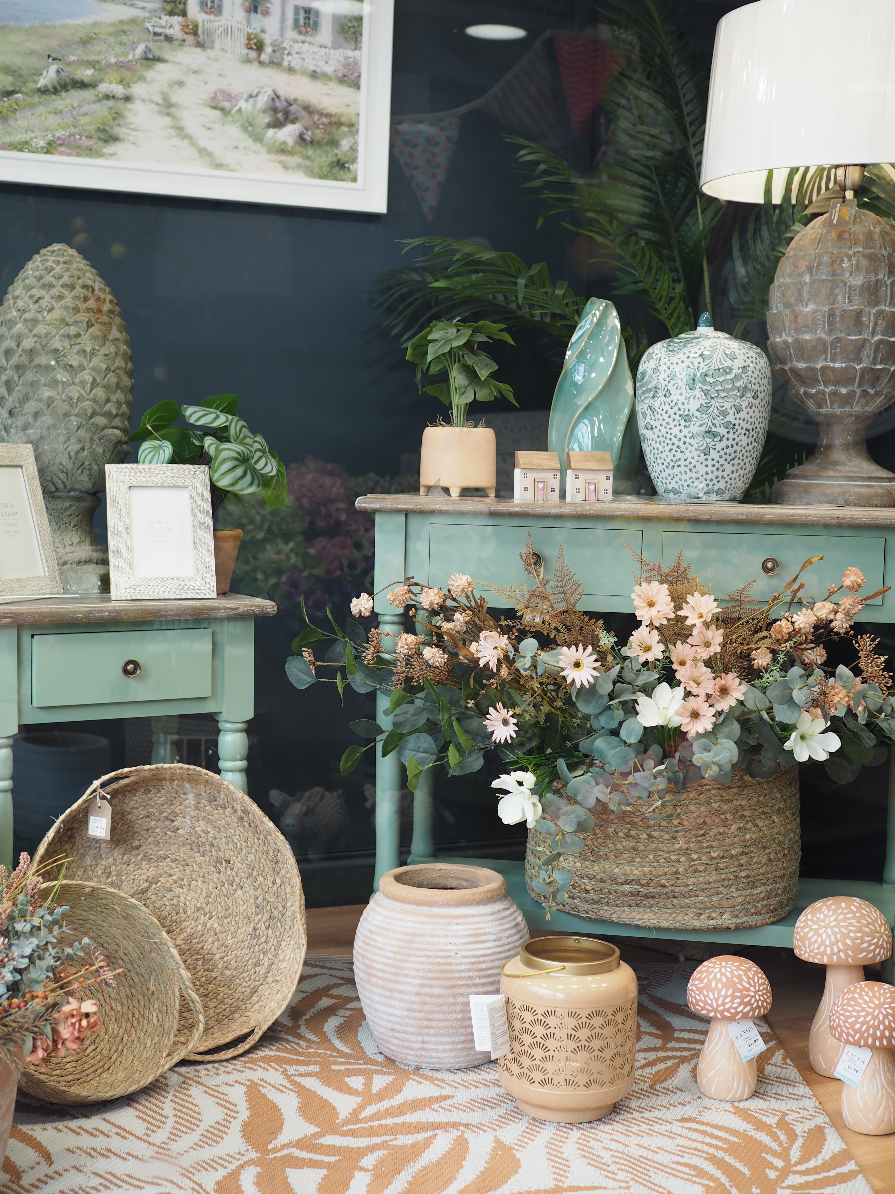 Two drawer green console table with shelf