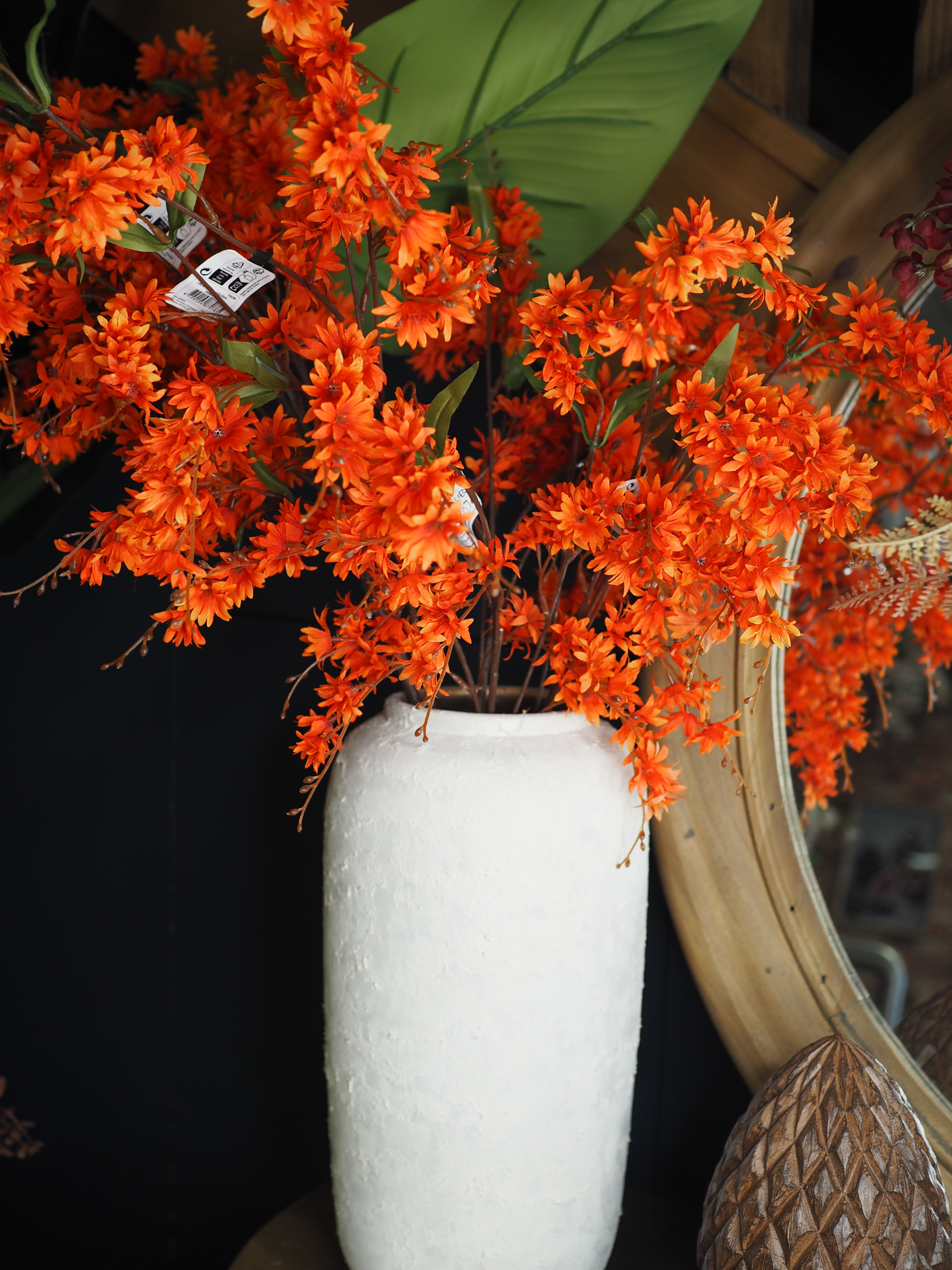 Tall orange daisy spray