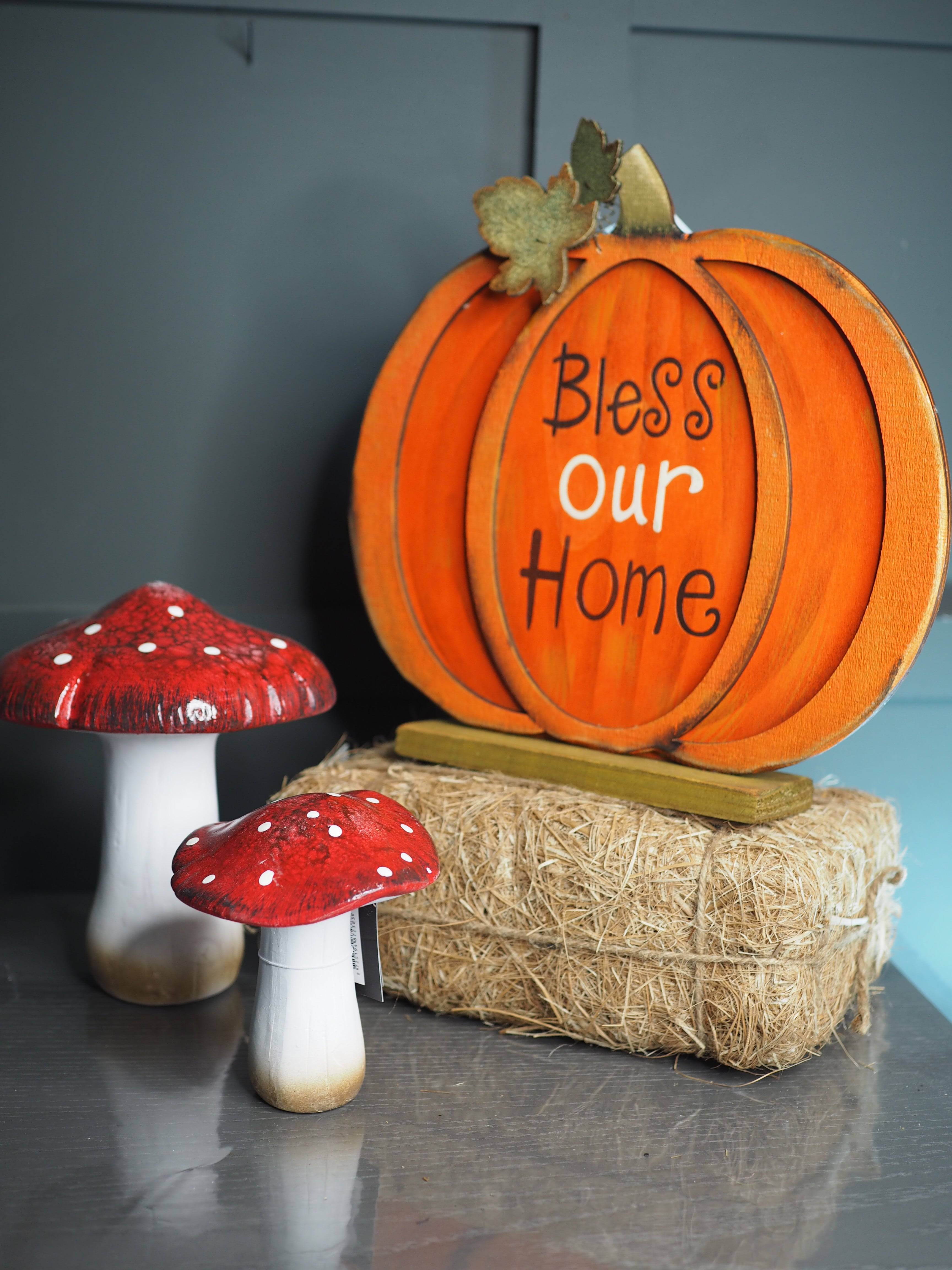 ' Bless our home'  wooden pumpkin on plinth