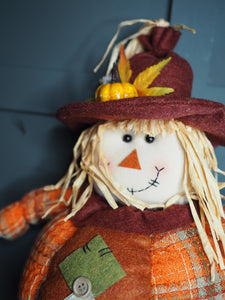 Scarecrow pumpkin standing figure