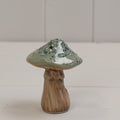 Green speckled ceramic mushroom