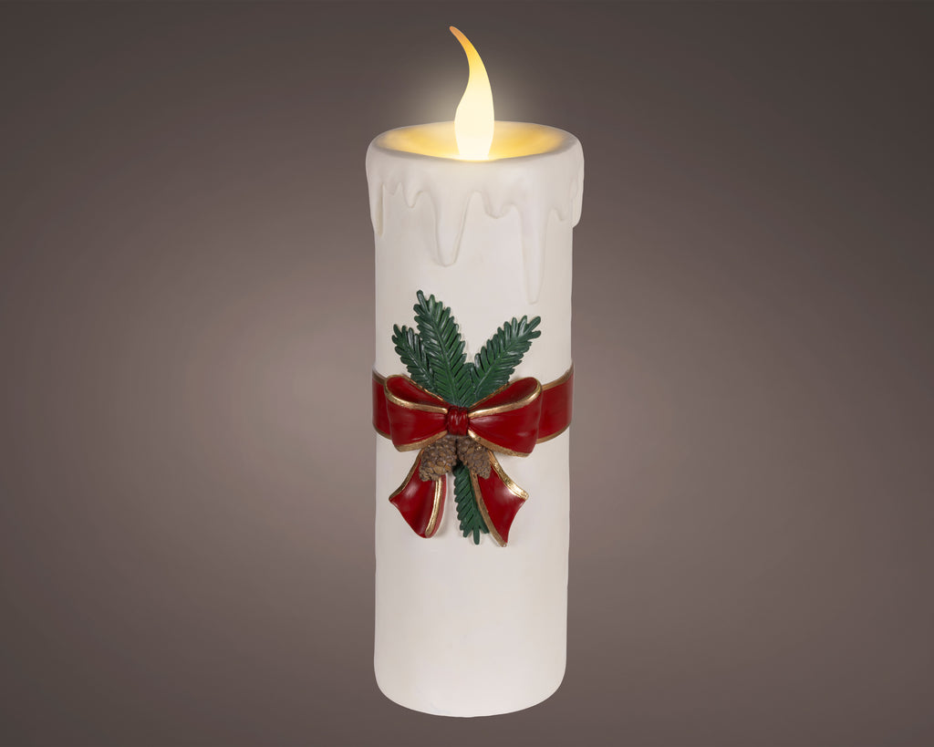 Tall white battery operated Christmas candle