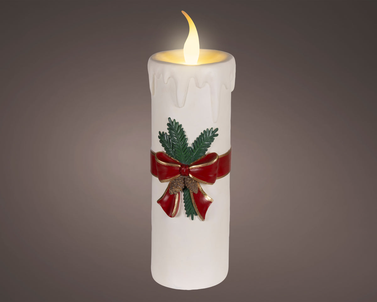 Tall white battery operated Christmas candle