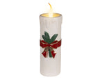 Tall white battery operated Christmas candle