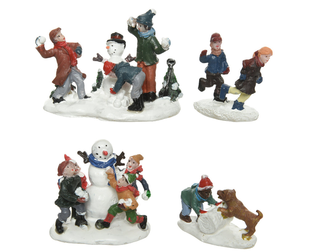 Figurines playing in the snow