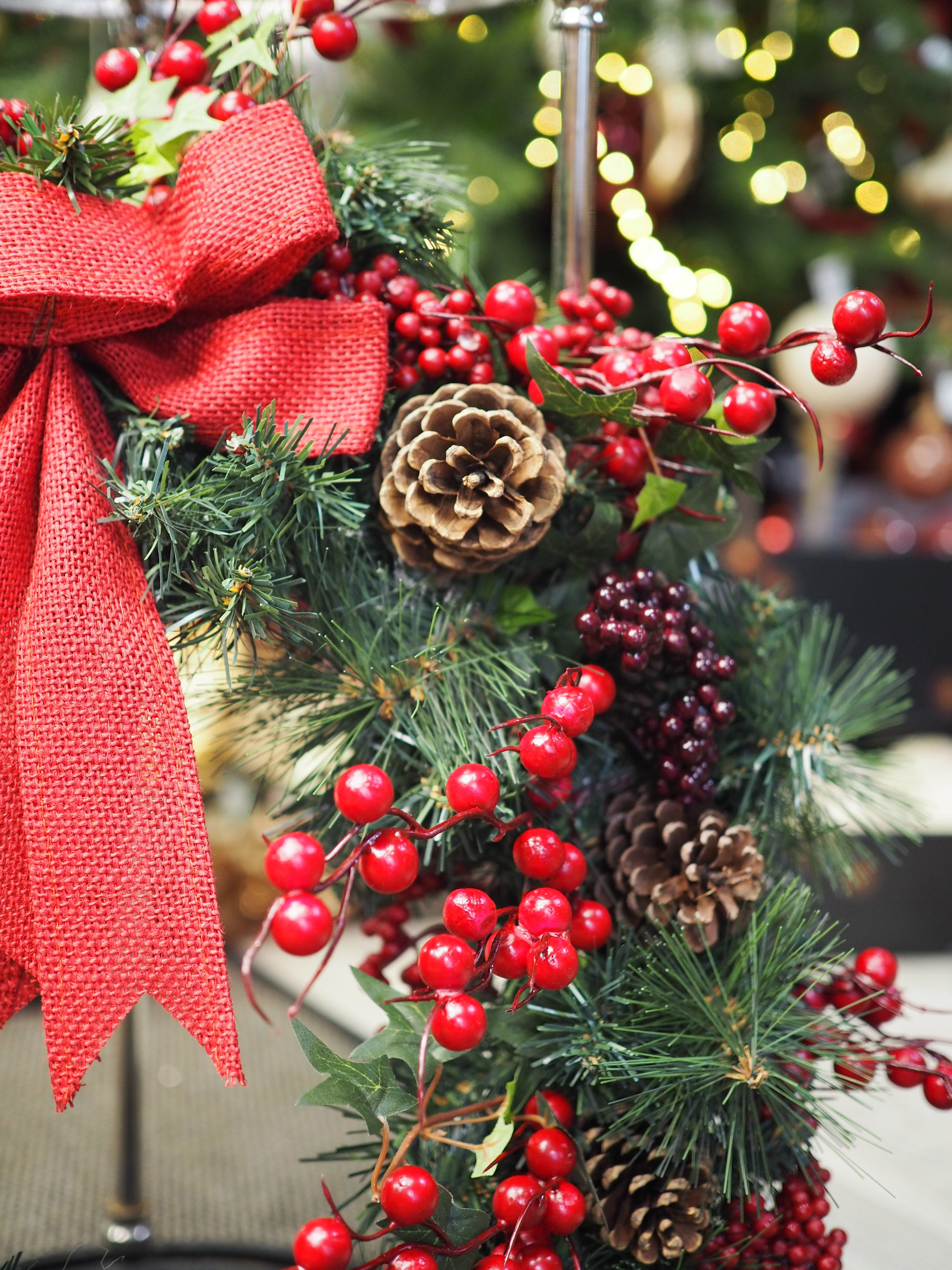 Traditional Christmas wreath with red berries and bow - large