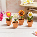 Bright and beautiful hand crochet flower in pot