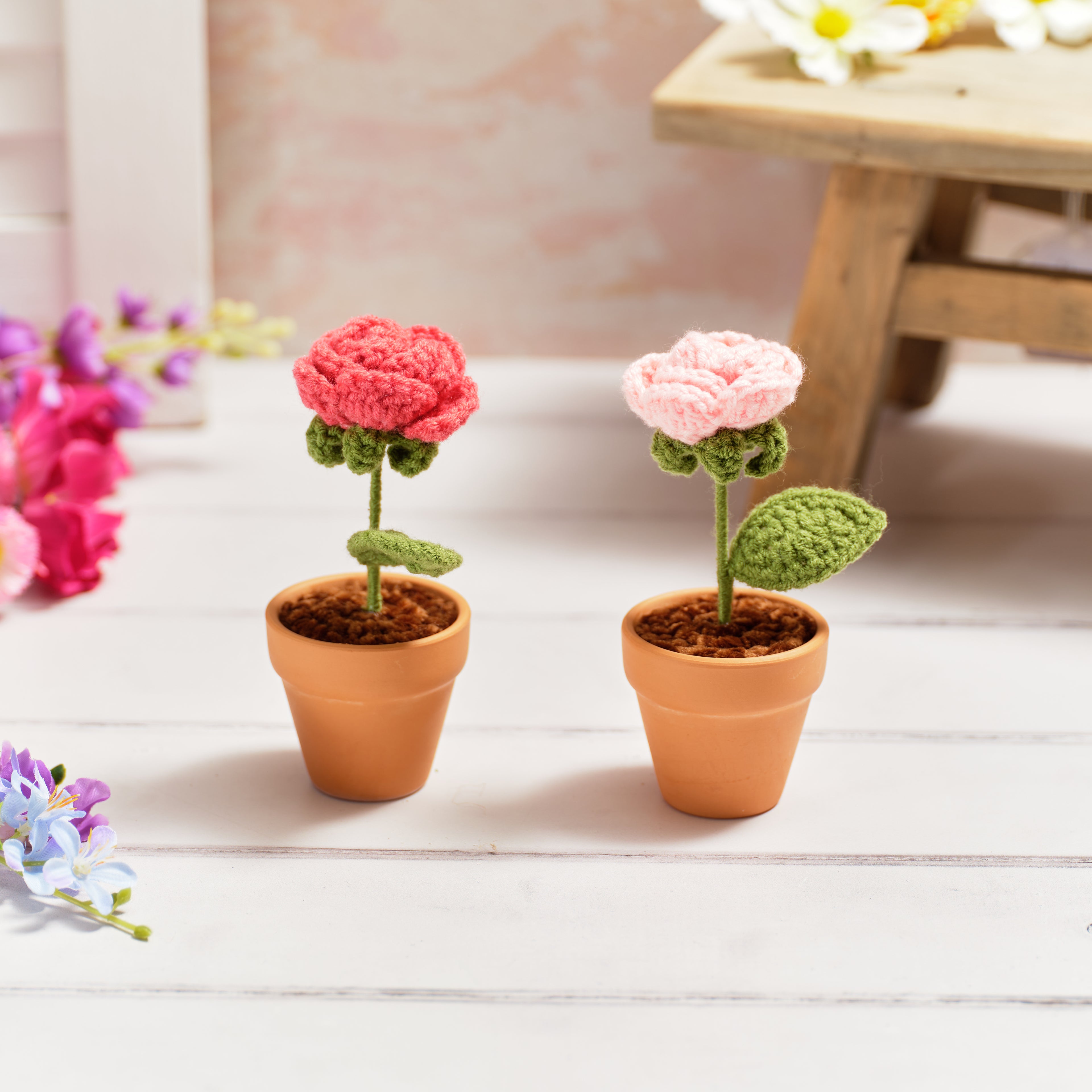 Bright and beautiful hand crochet rose in pot