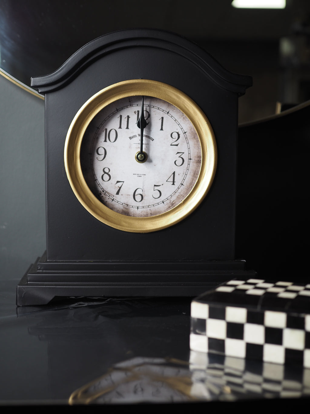 Black and gold mantle clock