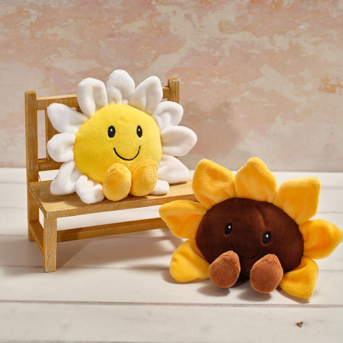 Plush sitting smiley face flower