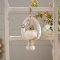 Farmhouse bunny in egg shape nest hanging dec