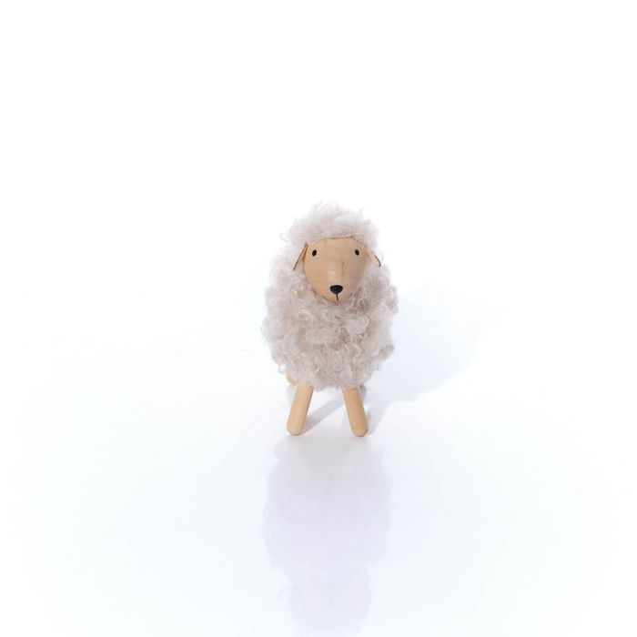 Fleecy standing sheep with wooden face