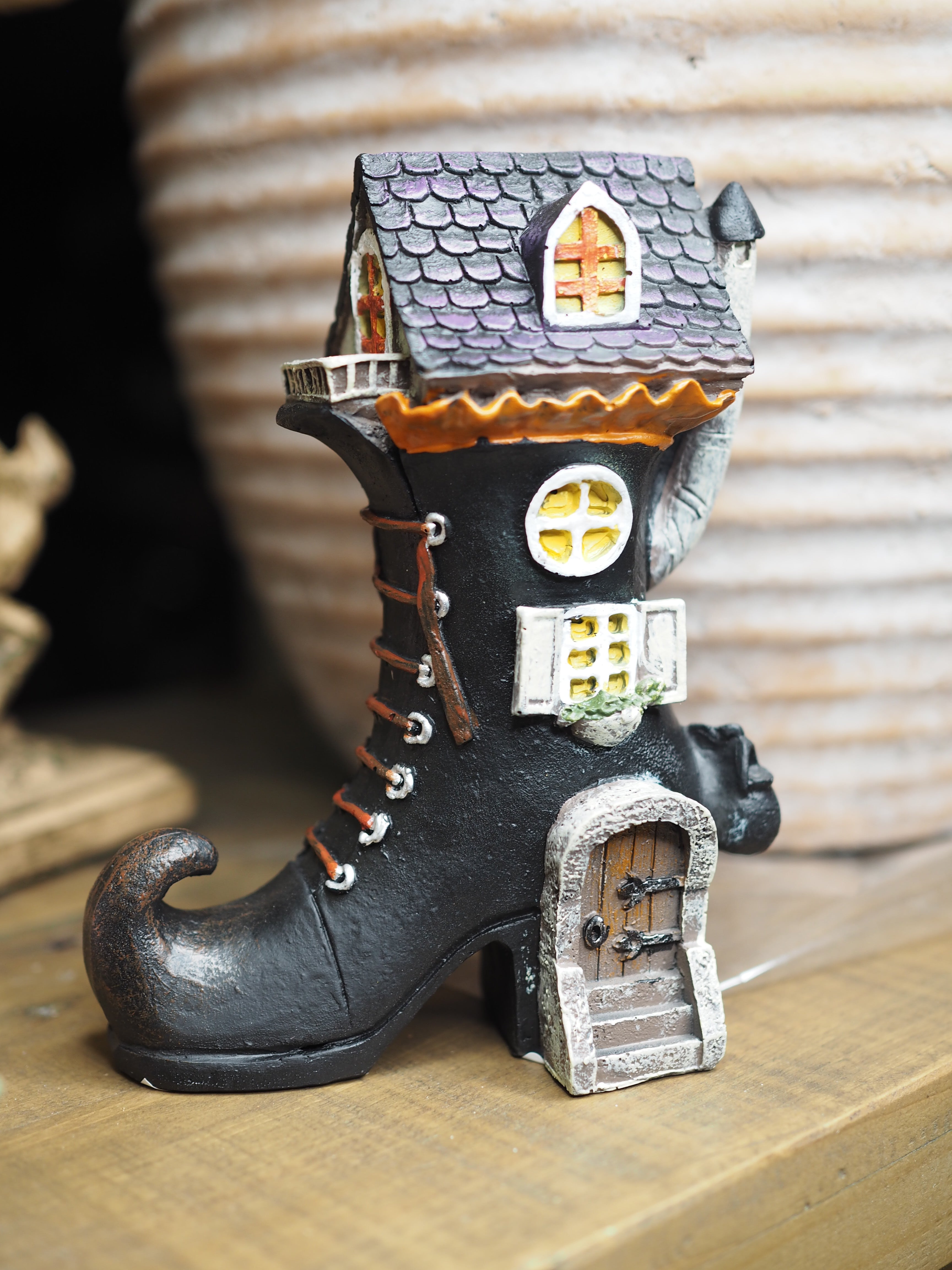 Black witch’s boot house