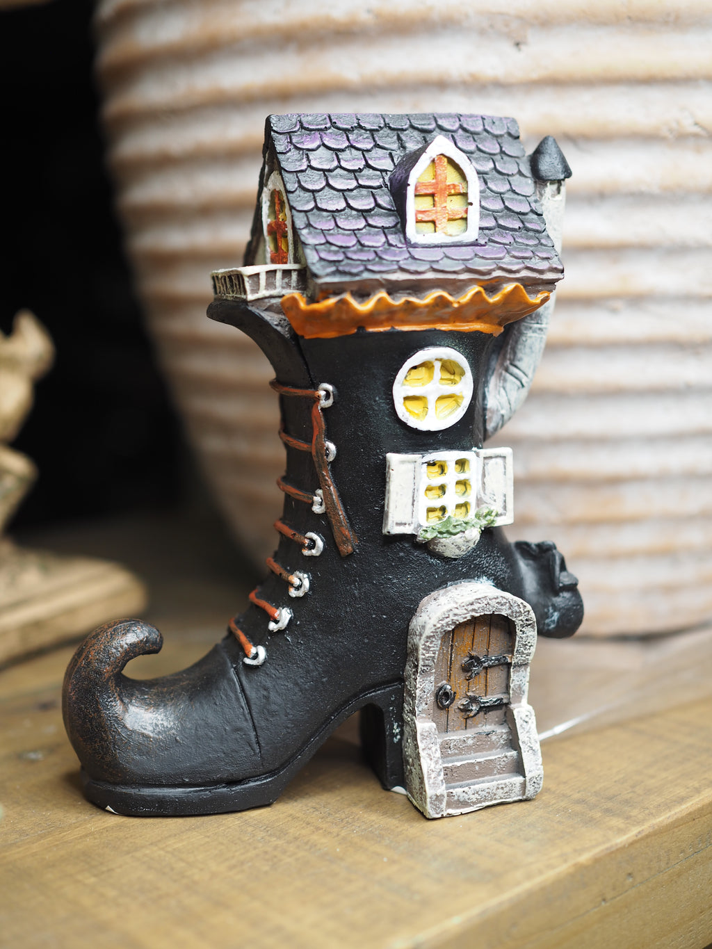 Black witch’s boot house