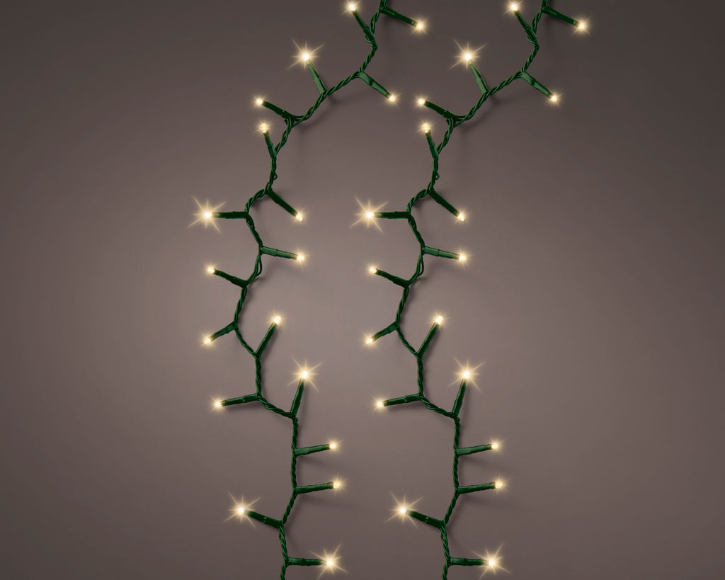 1000 LED compact soft gold lights on green cable