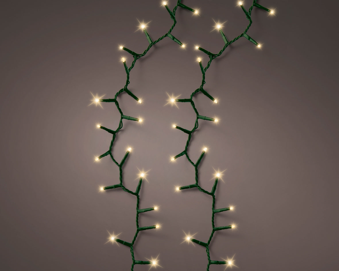 1000 LED compact soft gold lights on green cable