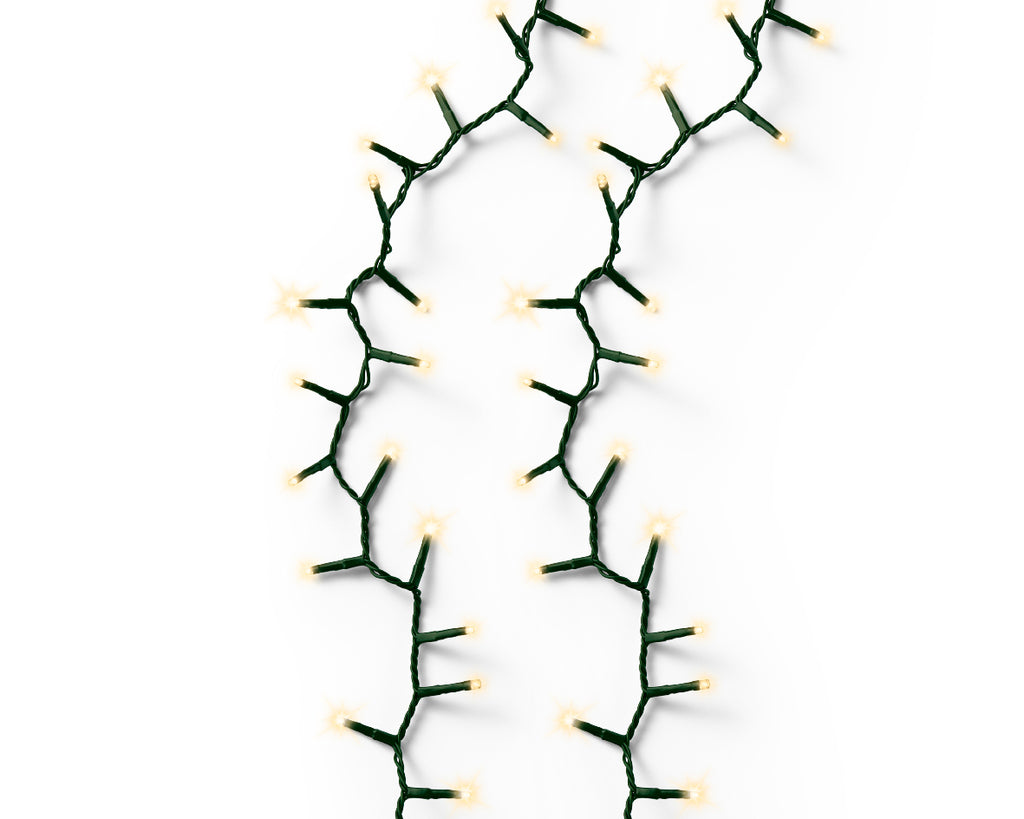 1000 LED compact soft gold lights on green cable