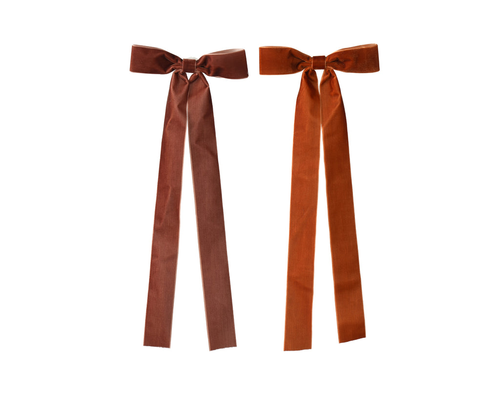 Brown/burnt orange long slim velvet bows