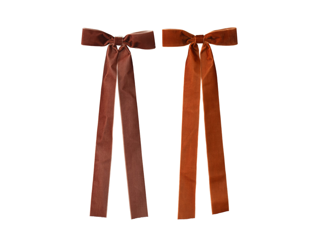 Brown/burnt orange long slim velvet bows