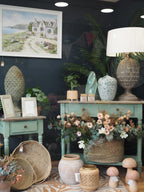 Two drawer green console table with shelf