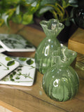 Green glass frill top bud vase