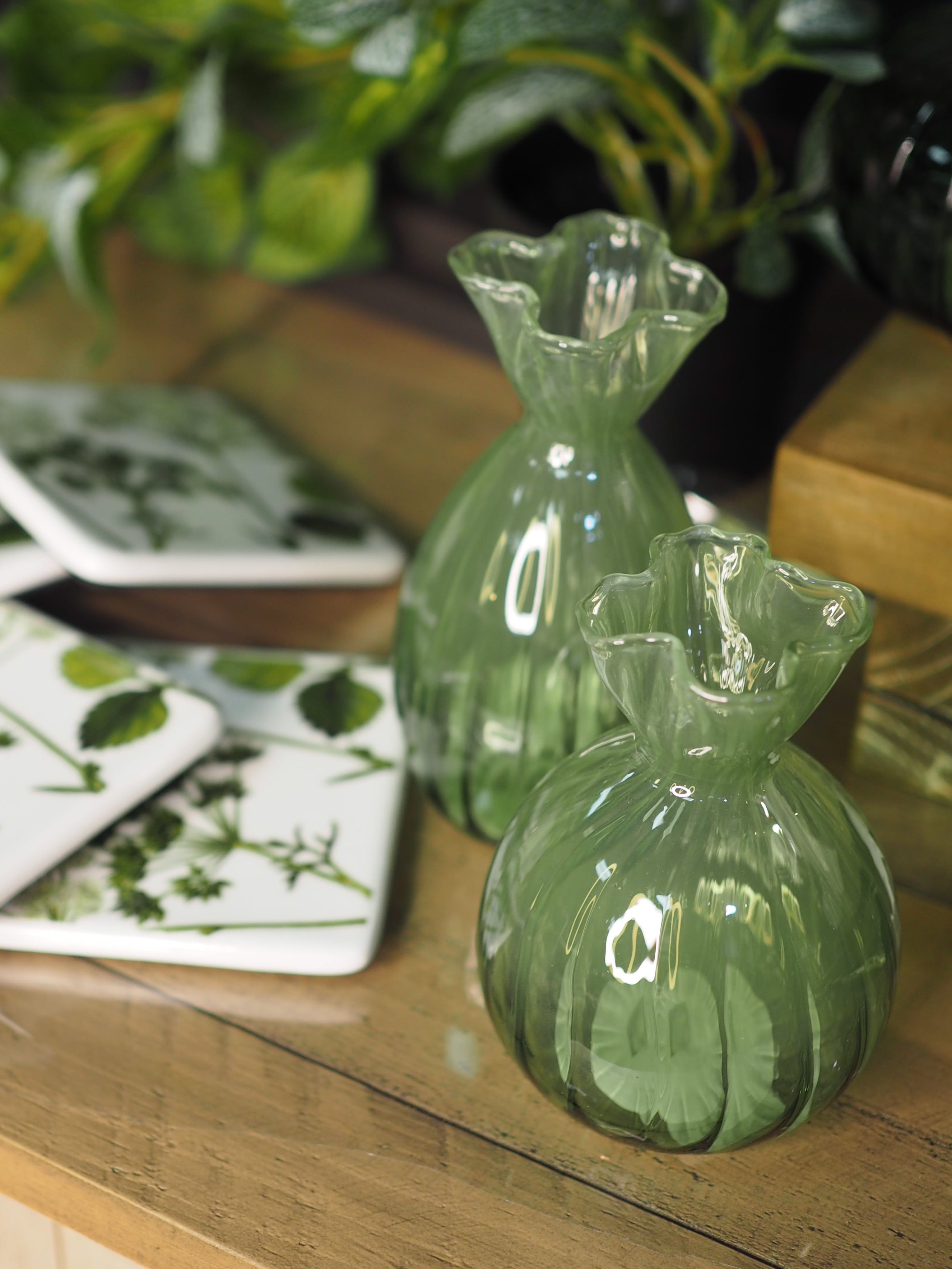 Green glass frill top bud vase